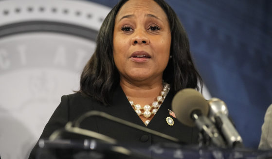 Fulton County District Attorney Fani Willis speaks in the Fulton County Government Center during a news conference in Atlanta on Aug. 14.