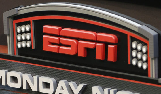 This Sept. 16, 2013 photo shows the ESPN logo prior to an NFL football game between the Cincinnati Bengals and the Pittsburgh Steelers, in Cincinnati.