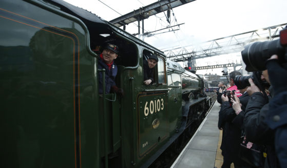 The Flying Scotsman, a historic locomotive, arrives at Kings Cross Railway Station in London to pick up passengers for its journey to York, England, in 2016. The locomotive was involved in a low-speed crash on Friday.