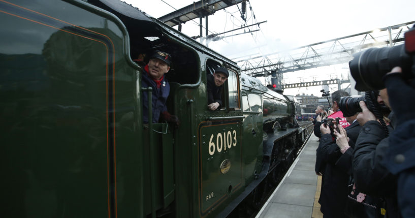 The Flying Scotsman, a historic locomotive, arrives at Kings Cross Railway Station in London to pick up passengers for its journey to York, England, in 2016. The locomotive was involved in a low-speed crash on Friday.