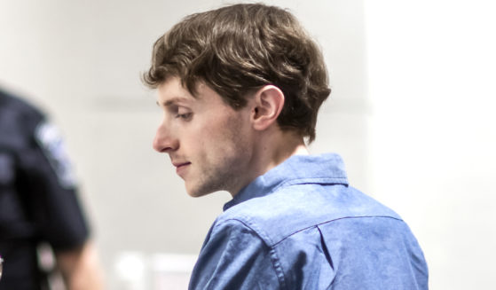 Logan Clegg talks with defense attorney Maya Dominguez at his trial at Merrimack County Superior Court in Concord, New Hampshire, on Oct. 3. On Monday, Clegg was found guilty of the murders of a retired couple in April 2022.