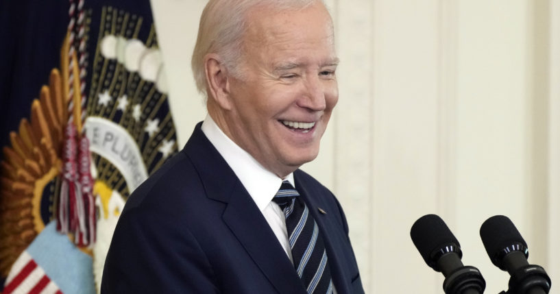 President Joe Biden speaks in the East Room of the White House in Washington, D.C., on Tuesday. Biden's campaign has announced his name will not appear on the Democratic primary ballot in New Hampshire.