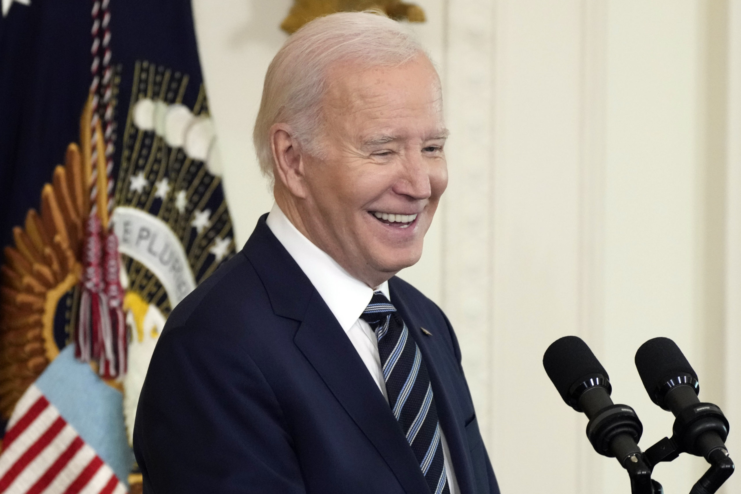 President Joe Biden speaks in the East Room of the White House in Washington, D.C., on Tuesday. Biden's campaign has announced his name will not appear on the Democratic primary ballot in New Hampshire.