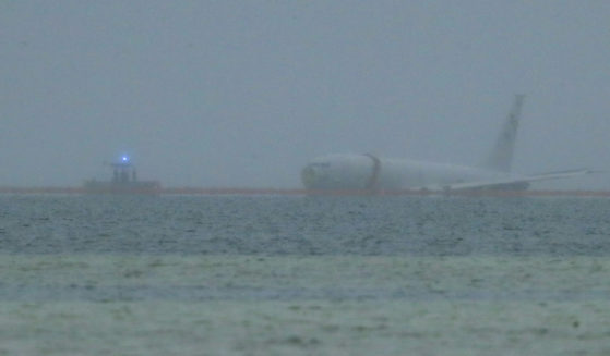 A U.S. Navy aircraft is seen in Kaneohe Bay in Hawaii on Monday. The plane overshot a runway and landed in the water.