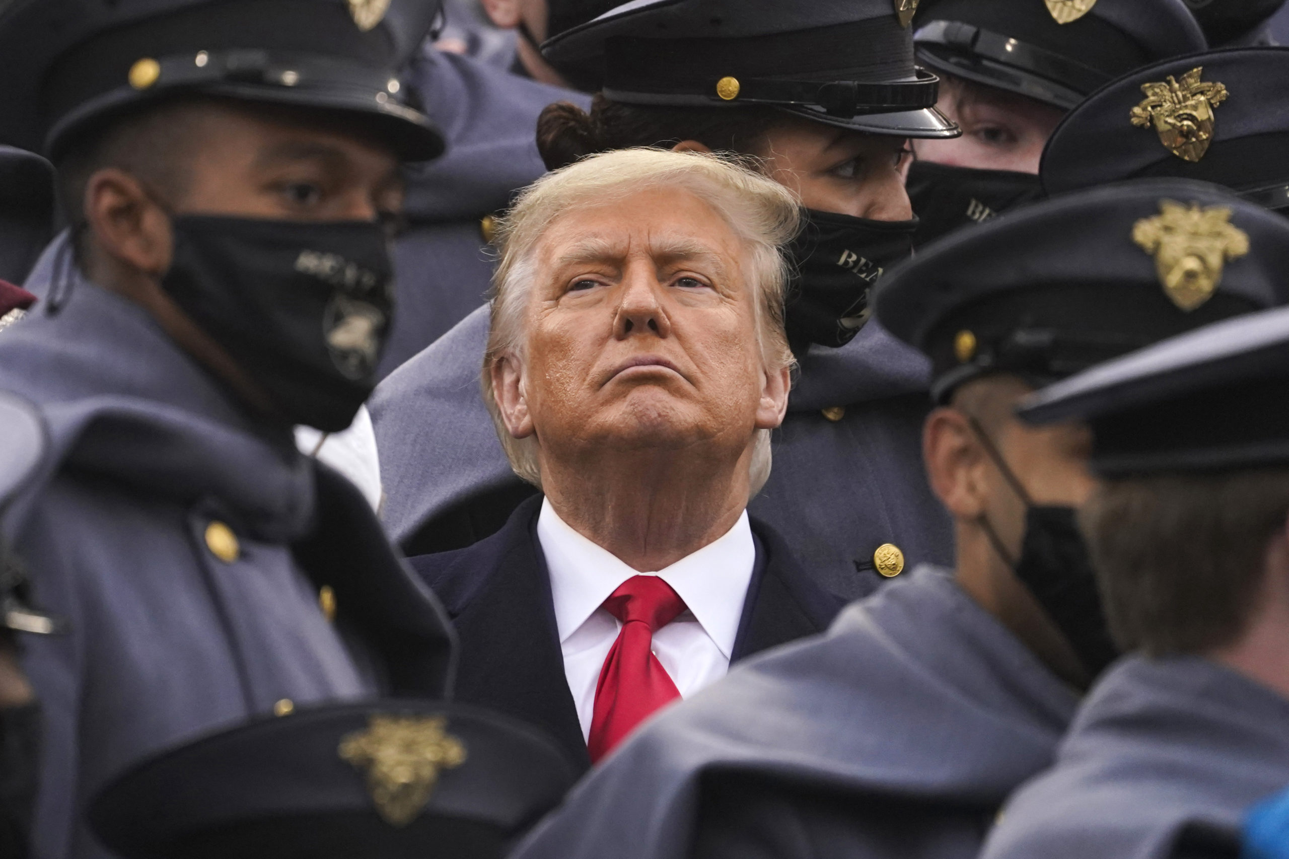 Then-President Donald Trump watches the first half of the 121st Army-Navy football game at the United State Military Academy in West Point, New York, on Dec. 12, 2020.