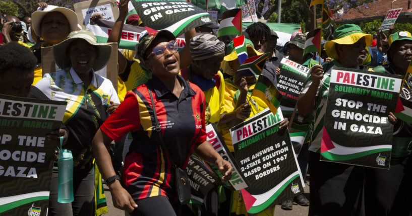 Pro-Palestinian supporters demonstrate at the entrance to the Israeli embassy in Pretoria, South Africa, on Oct. 20. On Monday South Africa withdrew its ambassador from Israel.