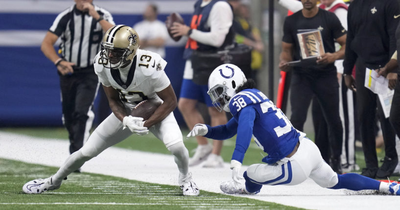 New Orleans Saints wide receiver Michael Thomas (13) sheds the tackle of Colts cornerback Tony Brown during the first half of an NFL game Oct. 29 in Indianapolis.