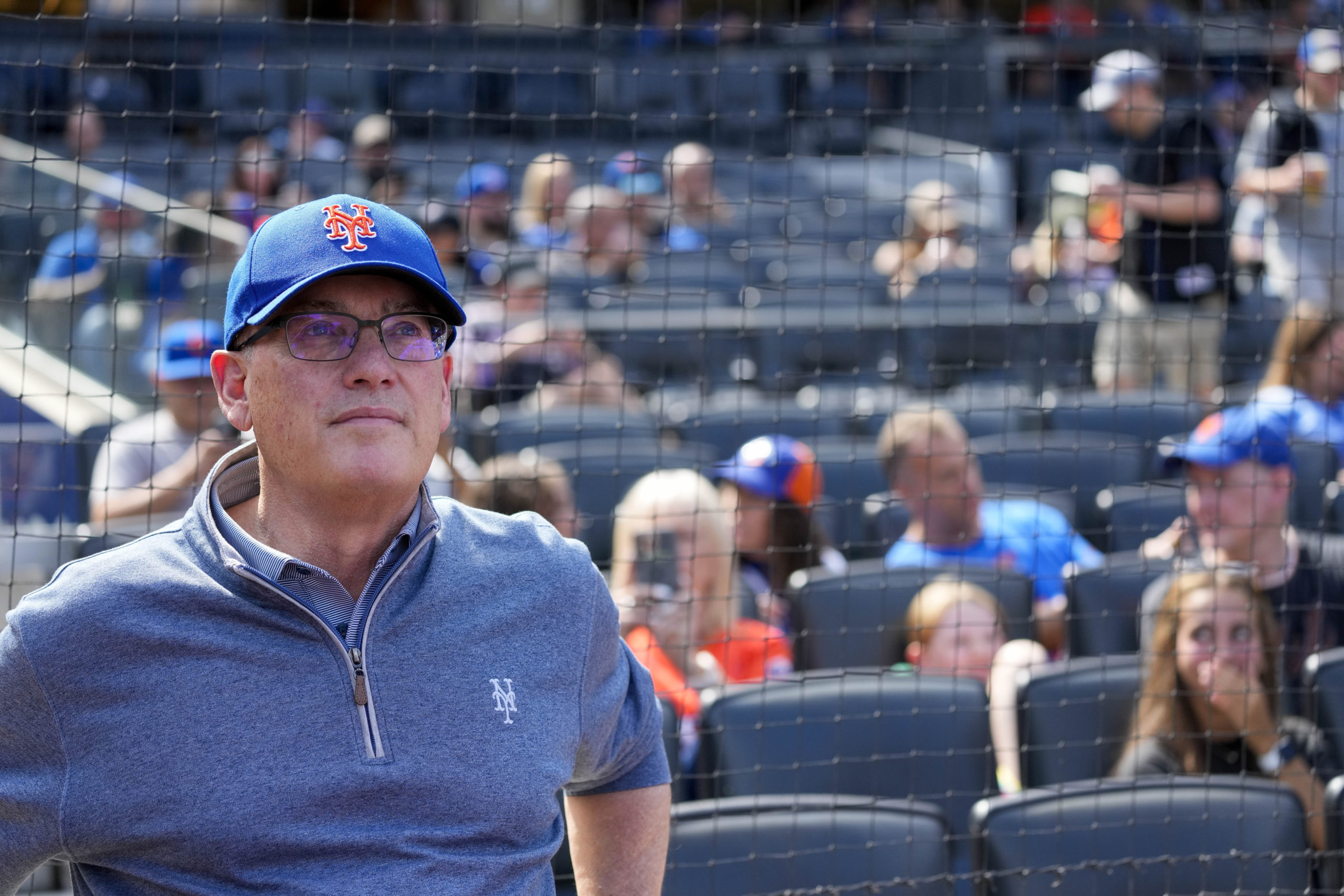 New York Mets owner Steve Cohen is seen at a baseball game between the Mets and the Cincinnati Reds on Sept. 17. Cohen's Mets finished 2023 with a tax payroll of $374.7 million, according to figures finalized by Major League Baseball on Thursday and obtained by The Associated Press.