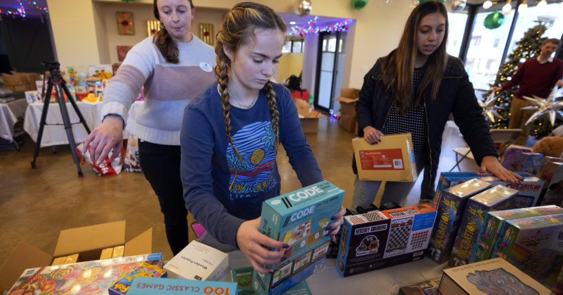 Volunteers arrange toys at The Toy Store, a free, referral-based toy store, in Nashville, Tennessee, on Thursday.