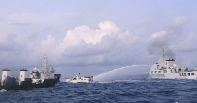 A Chinese Coast Guard ship is shown using water cannons on a Philippine navy-operated supply boat in the disputed South China Sea on Sunday.