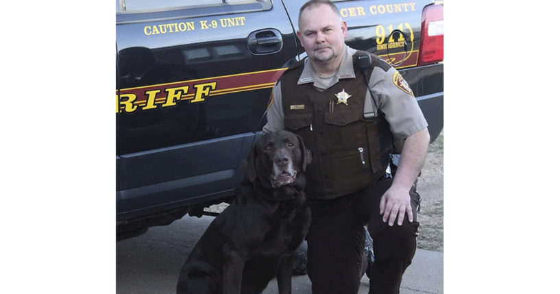 Mercer County Sheriff's Deputy Paul Martin is pictured with his retired K9 Goliath. Martin was killed in a crash on Dec. 6.