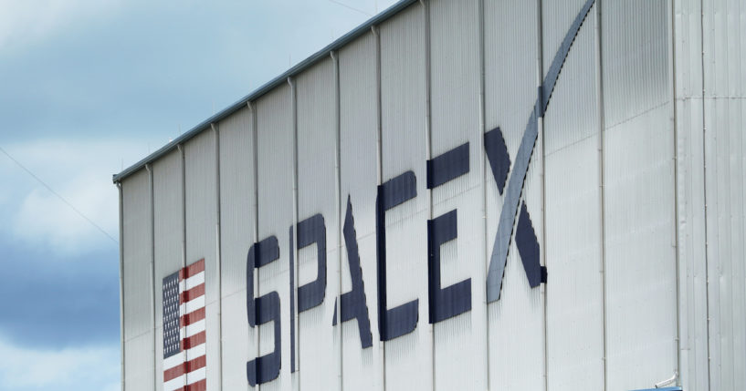 The SpaceX logo is displayed on a building at the Kennedy Space Center in Cape Canaveral, Florida, on May 26, 2020.