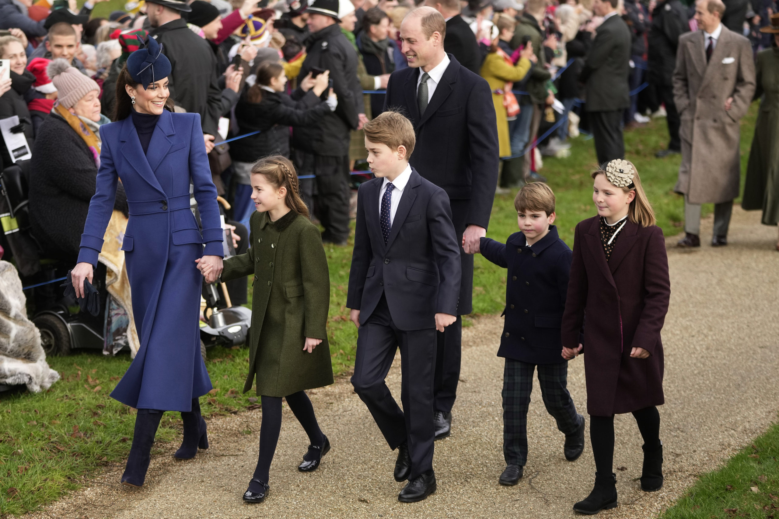 From left to right, Kate, Princess of Wales, Princess Charlotte, Prince George, William, Prince of Wales, Prince Louis, and Mia Tindall arrive at St. Mary Magdalene Church in Norfolk, England, on Dec. 25, to attend the Christmas Day service.