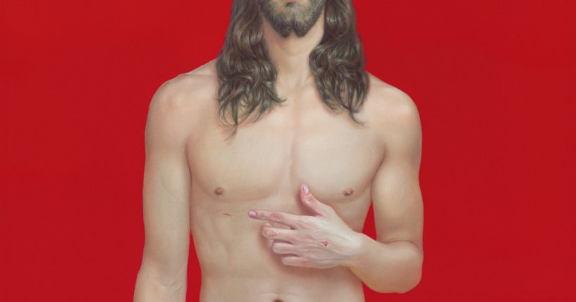 A poster by Seville artist Salustiano Garcia Cruz depicts a young, handsome, fit and fresh-faced Jesus wearing a shroud as loincloth. There is no crown of thorns, no suffering face and just two tiny stab wounds on the hand and ribcage.