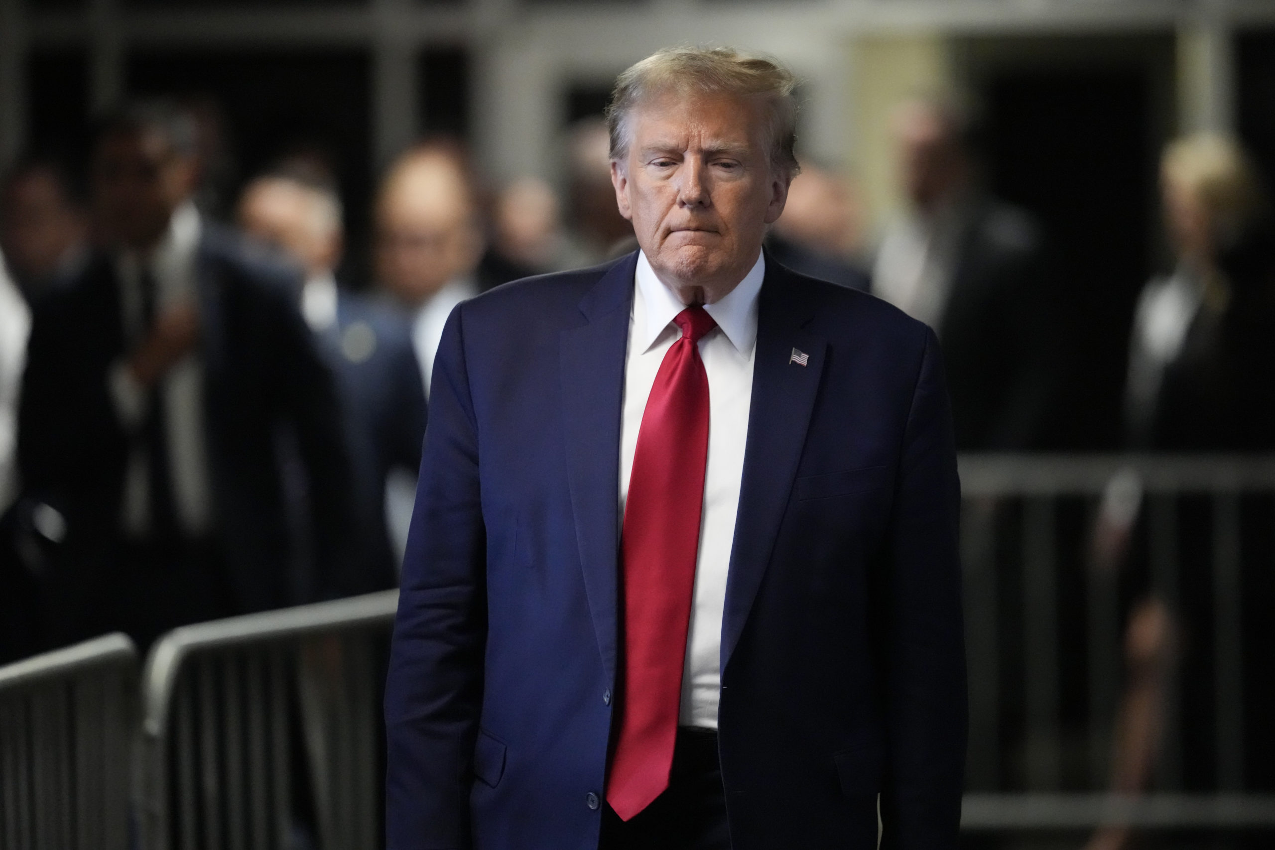 Former President Donald Trump leaves Manhattan criminal court in New York City on Feb. 15.