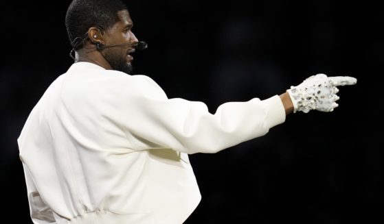 Usher performs during halftime of Super Bowl LVIII in Las Vegas, Nevada, on Sunday.