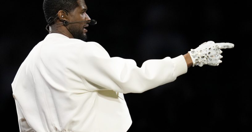 Usher performs during halftime of Super Bowl LVIII in Las Vegas, Nevada, on Sunday.