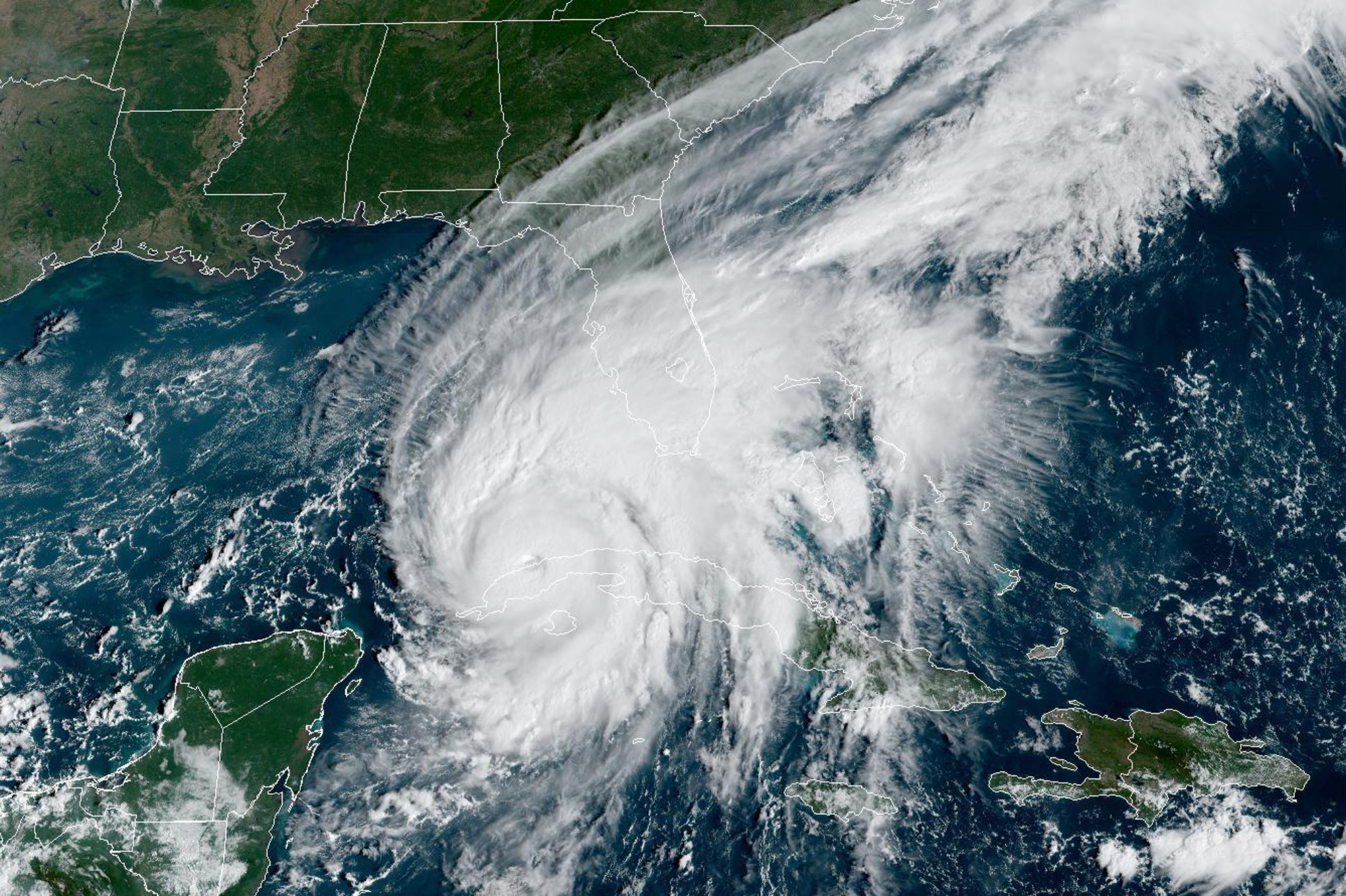 This GOES-East GeoColor satellite image taken at 9:56 a.m. EDT on Sept. 27, 2022, shows Hurricane Ian passing over western Cuba.