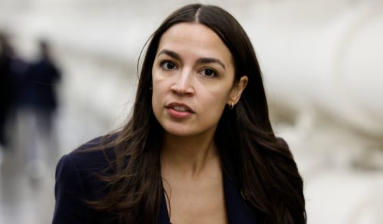 Rep. Alexandria Ocasio-Cortez walks to the House Chambers of the U.S. Capitol Building in Washington, D.C, on Nov. 14.