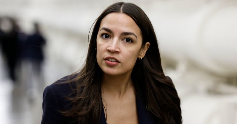 Rep. Alexandria Ocasio-Cortez walks to the House Chambers of the U.S. Capitol Building in Washington, D.C, on Nov. 14.