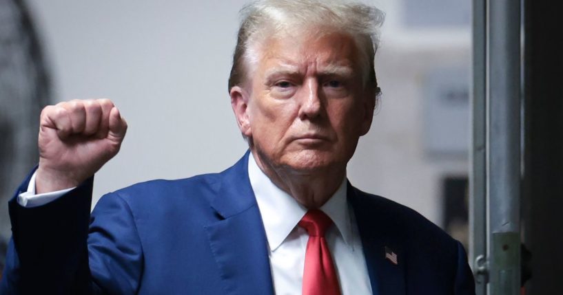 Former President Donald Trump gestures as he returns from a break during his trial at Manhattan criminal court in New York City on Monday.