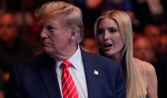 Donald Trump talking with Ivanka Trump before an MMA match