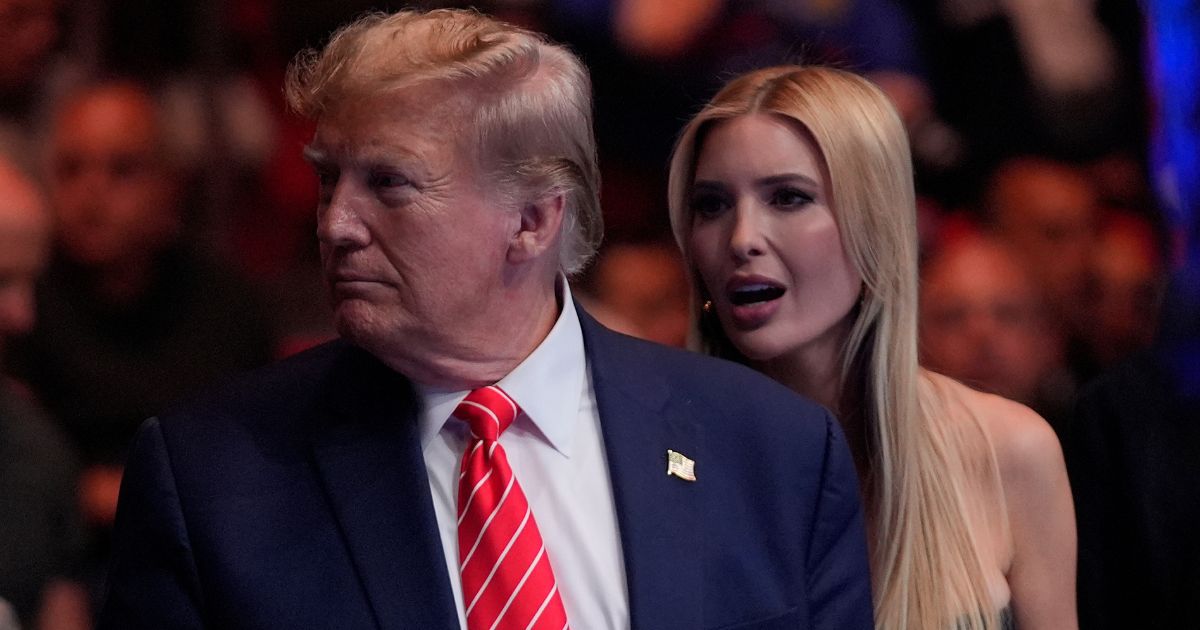 Donald Trump talking with Ivanka Trump before an MMA match