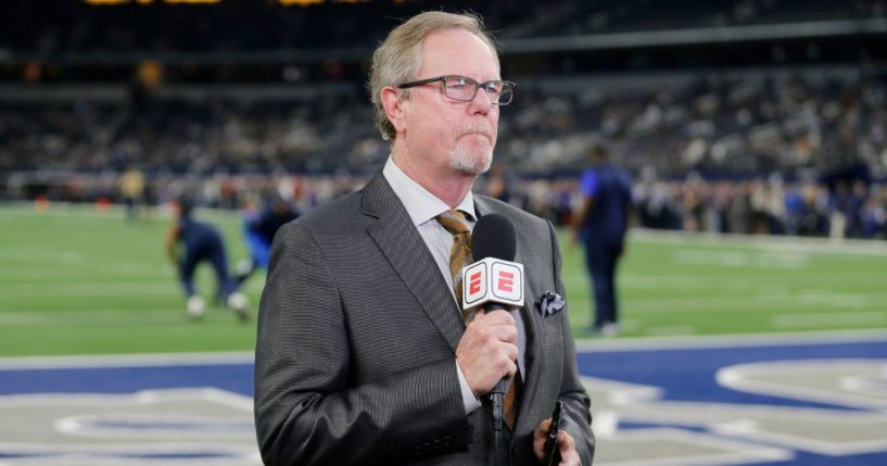 ESPN reporter Ed Werder reports from the field prior to an an NFL football game between the Minnesota Vikings and the Dallas Cowboys in Arlington, Texas, in a file photo from Nov. 10, 2019. Werder announced Thursday he and the sports network are parting ways.