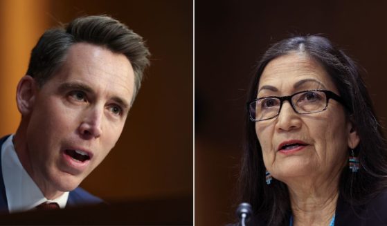 Sen. Josh Hawley, left, questioned Interior Secretary Deb Haaland, right, during a Senate hearing on Thursday.