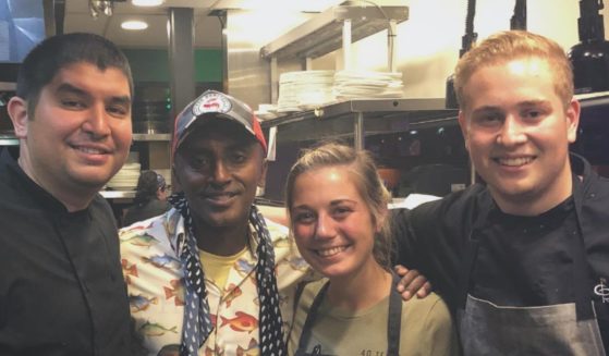 Joey Fecci and friends in a commercial kitchen