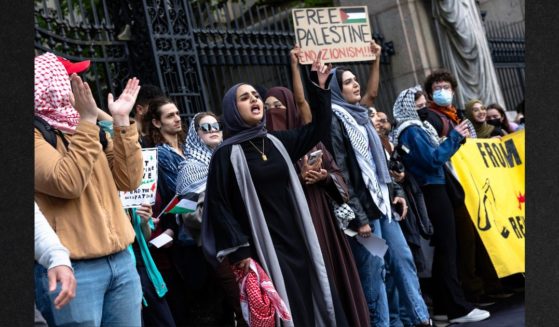 Pro-Palestinian protesters hold a rally outside of Columbia University on Tuesday in New York City.