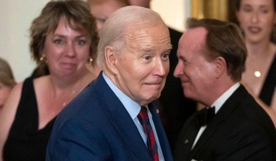 Joe greeting visitors at a state dinner at the White House