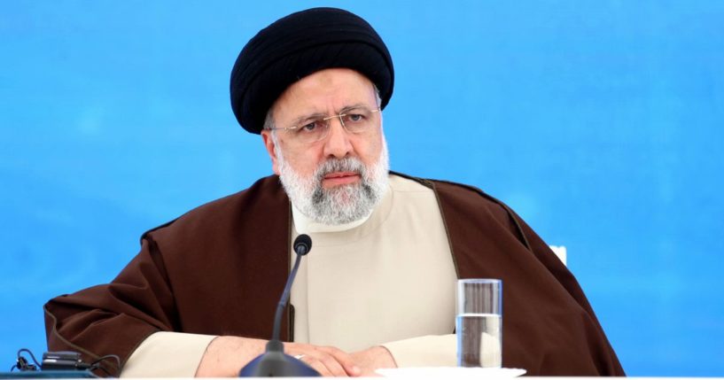 Iranian President Ebrahim Raisi looks on during a ceremony marking the raising the Qiz Qalasi Dam, constructed on the Aras River on the joint borders between Iran and Azerbaijan, in Jabrayil, Azerbaijan, on Sunday. He died in a helicopter crash on the way home.