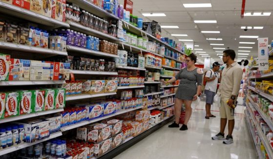 Customers shop at a Target store in Miami on May 20.