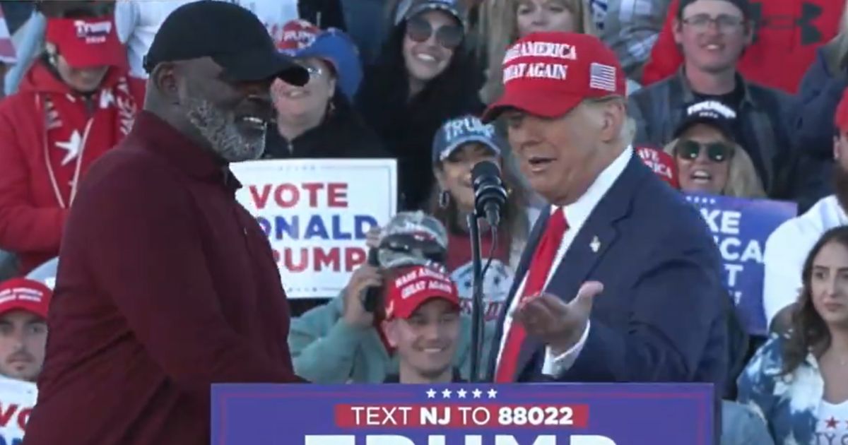 Former President Donald Trump, right, greets former NFL star Lawrence Taylor during a campaign event Saturday in Wildwood, New Jersey.