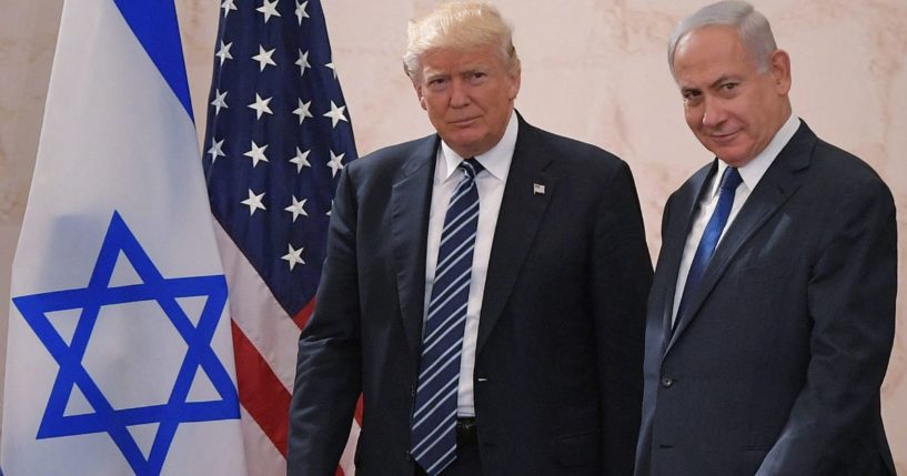 President Donald Trump walks alongside Israel's Prime Minister Benjamin Netanyahu as he arrives to deliver a speech at the Israel Museum in Jerusalem on May 23, 2017.