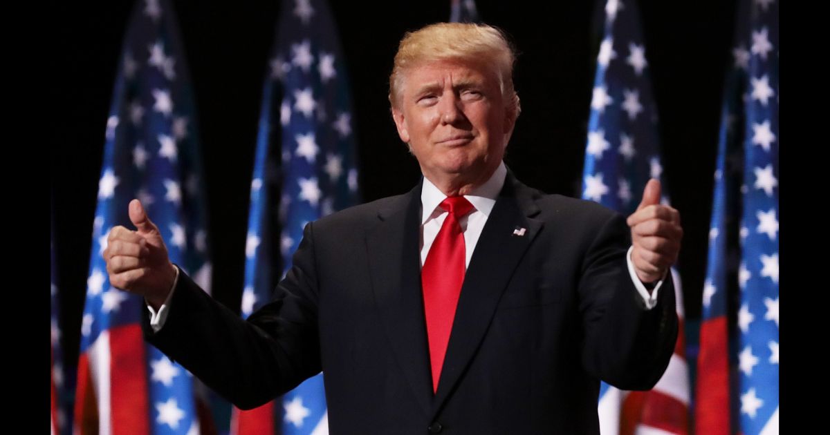 Former President Donald Trump making the thumbs up sign at the Republican National Convention in 2016.