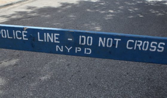 A police barricade stands in New York City in this stock photo. On Thursday, authorities said a 71-year-old pedestrian was killed during a police chase in the city.