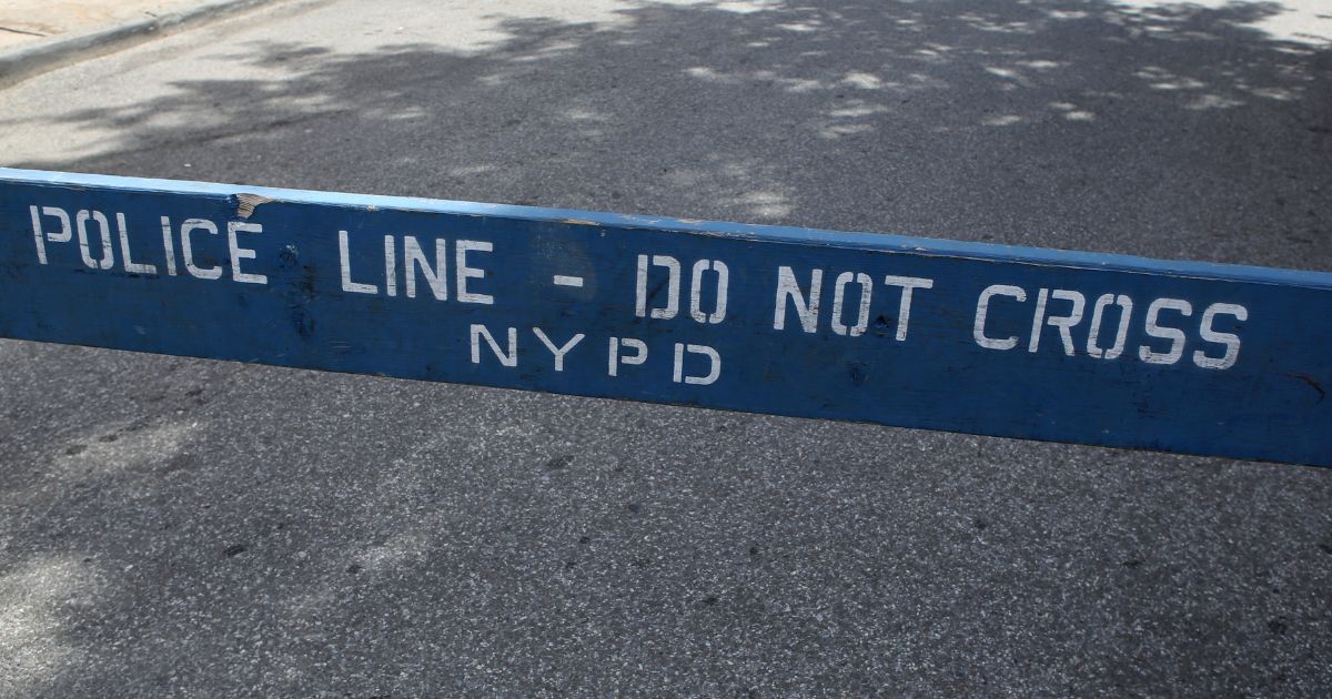 A police barricade stands in New York City in this stock photo. On Thursday, authorities said a 71-year-old pedestrian was killed during a police chase in the city.