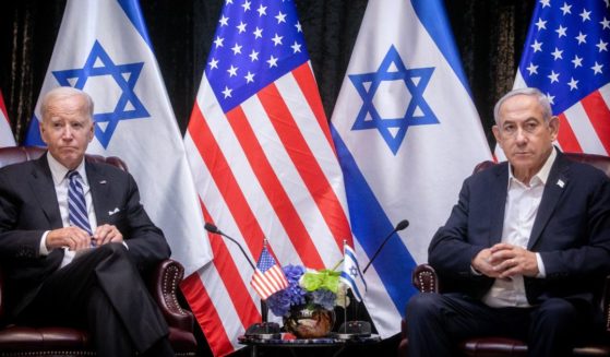 President Joe Biden sits with Israeli Prime Minister Benjamin Netanyahu at the start of the Israeli war cabinet meeting in Tel Aviv on Oct. 18.