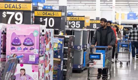 Shoppers walk the aisles of Walmart for Black Friday deals in Dunwoody, Georgia, on Nov. 25, 2022.