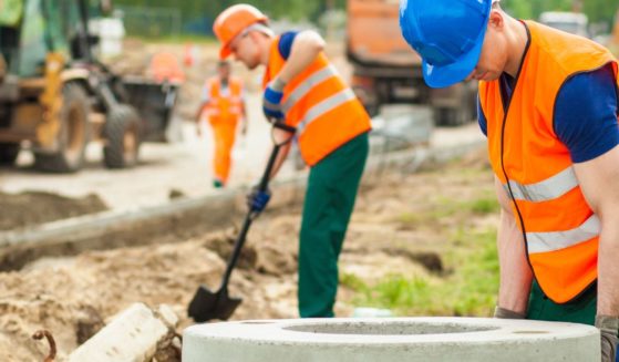 a stock photo of road workers