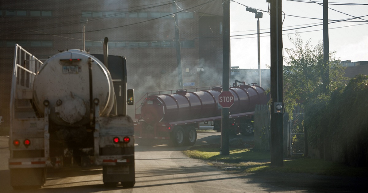 Tractor-trailers carry fresh water to natural gas wells in Williamsport, Pennsylvania, in a 2012 file photo.