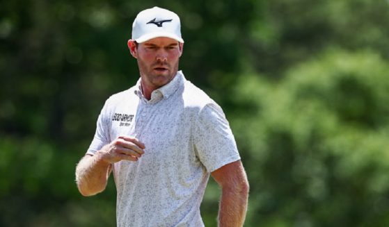 The late Grayson Murray is pictured eyeing a putt in a file photo from May 12 at the Wells Fargo Championship at Quail Hollow Club in Clifton, North Carolina.