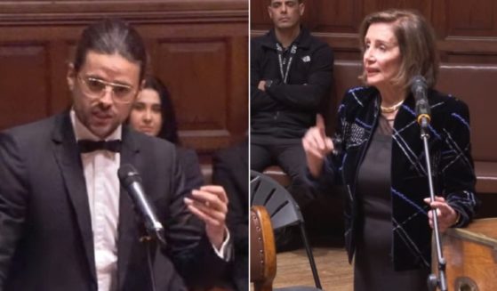 Winston Marshall, left, former banjo player and guitarist for the folk group Mumford & Sons; former House Speaker Nancy Pelosi, right, during an April 25 debate at Oxford University in Oxford, England.