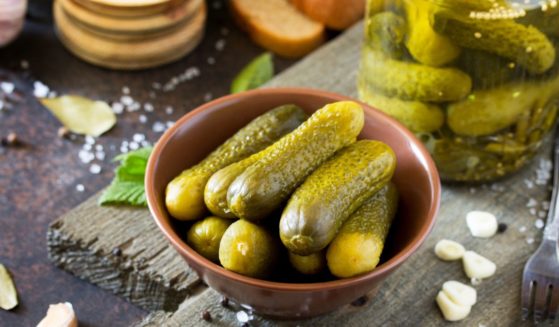 a stock image of a bowl of pickles