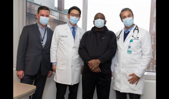 This X screen shot shows Rick Slayman alongside medical professionals. Slayman became the first person to receive a pig kidney transplant, and passed away a few months after the operation.