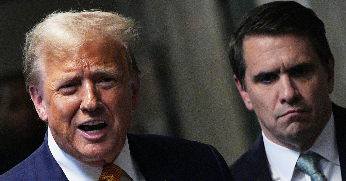 Former US President Donald Trump, with attorney Todd Blanche, speaks to the media at his trial for allegedly covering up hush money payments linked to an extramarital affair with Stormy Daniels, at Manhattan Criminal Court on May 14, 2024 in New York City.