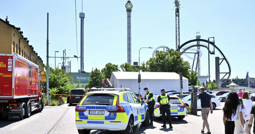 Police cordon off the Gröna Lund amusement park in Stockholm, Sunday, June 25, 2023. Swedish authorities on Friday, June 14, 2024, harshly criticized a Stockholm amusement park for insuffient testing of new parts to a roller coaster train which derailed last year, sending some passengers plunging to the ground in an amusement park accident, leaving one dead and nine injured.