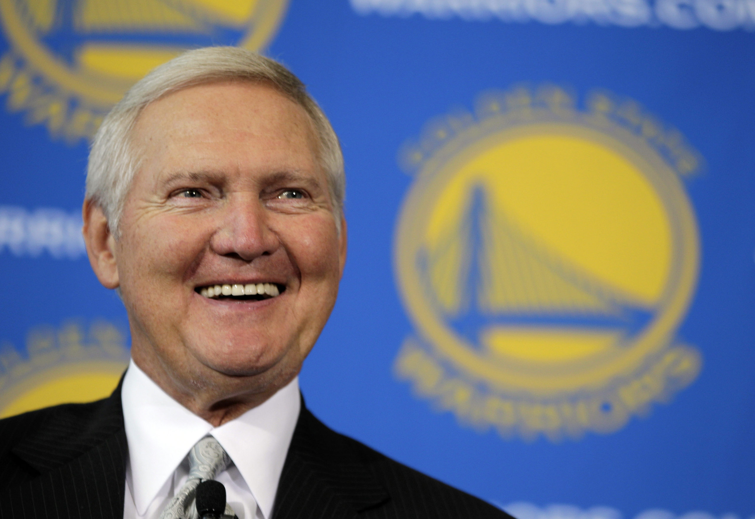 Jerry West smiles after being introduced as a new member of the Golden State Warriors basketball club's Executive Board, during a news conference in San Francisco, California, on May 24, 2011.